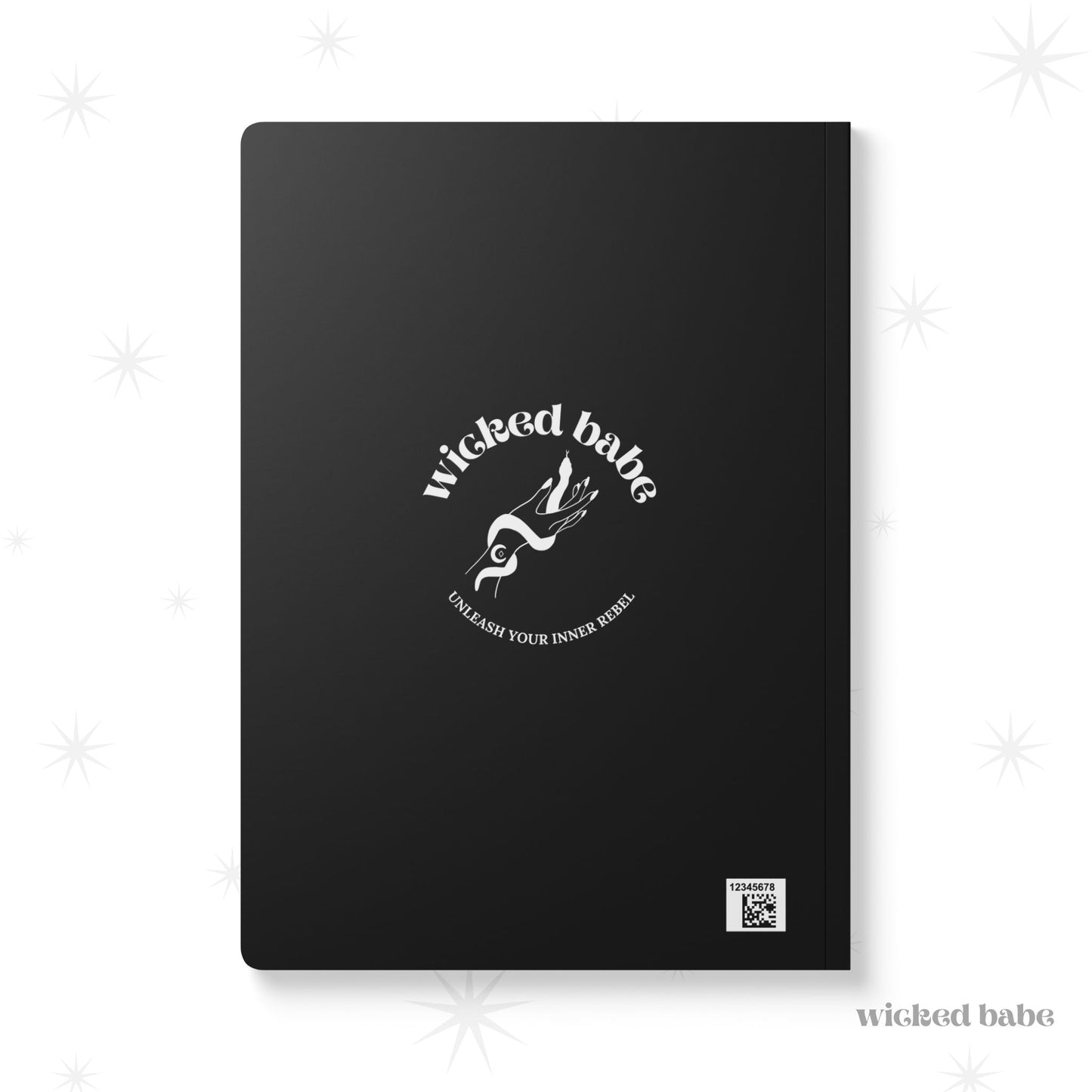 Back of black softcover journal notebook with white wicked babe hand with serpent logo in the center