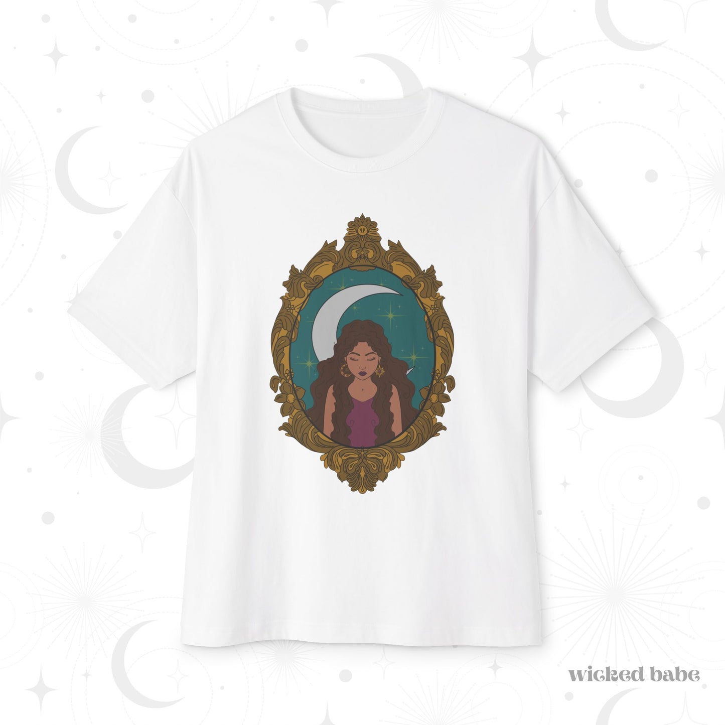 Oversized short sleeve white t-shirt with a design of a tan skinned woman with brown wavy hair wearing purple in front of large crescent moon on a teal background surrounded by ornate gold frame