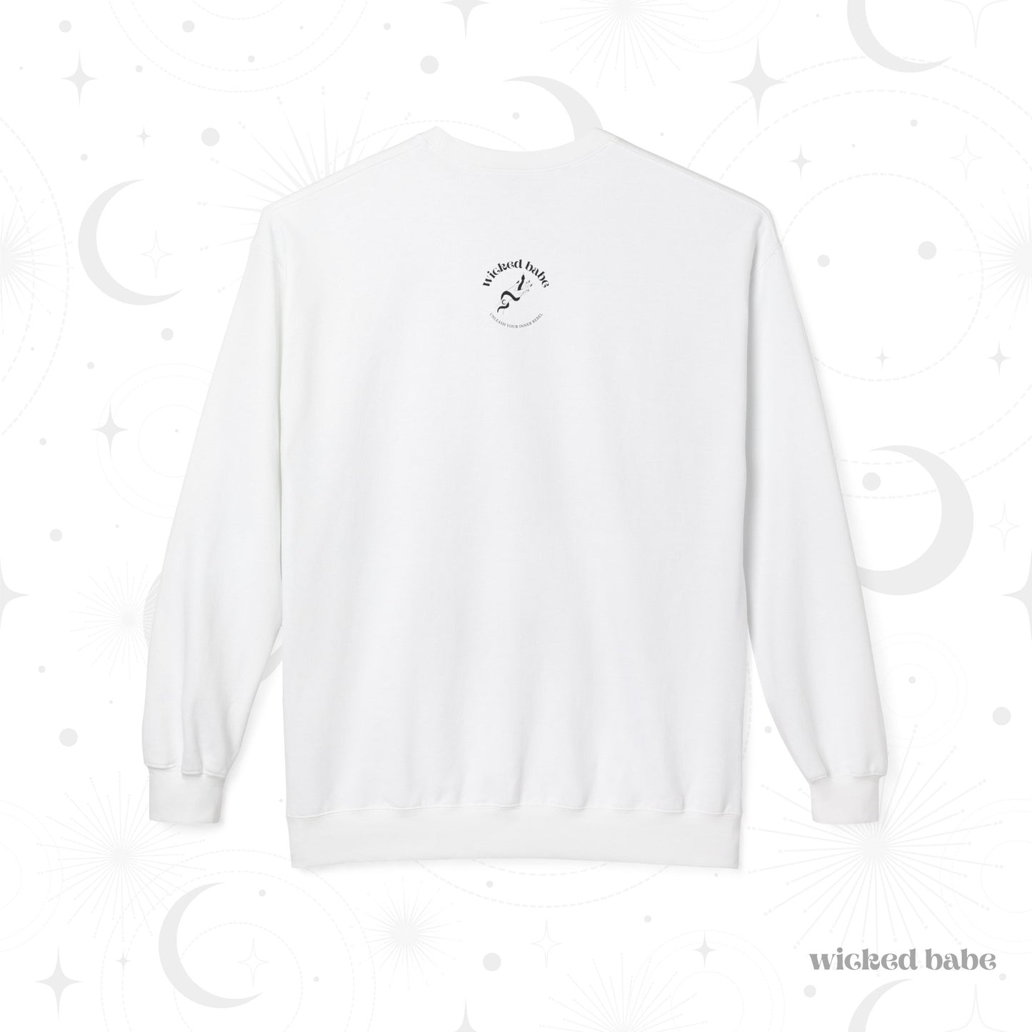 The back of a white long sleeve crewneck sweatshirt with a small black wicked babe hand with serpent logo in the upper center