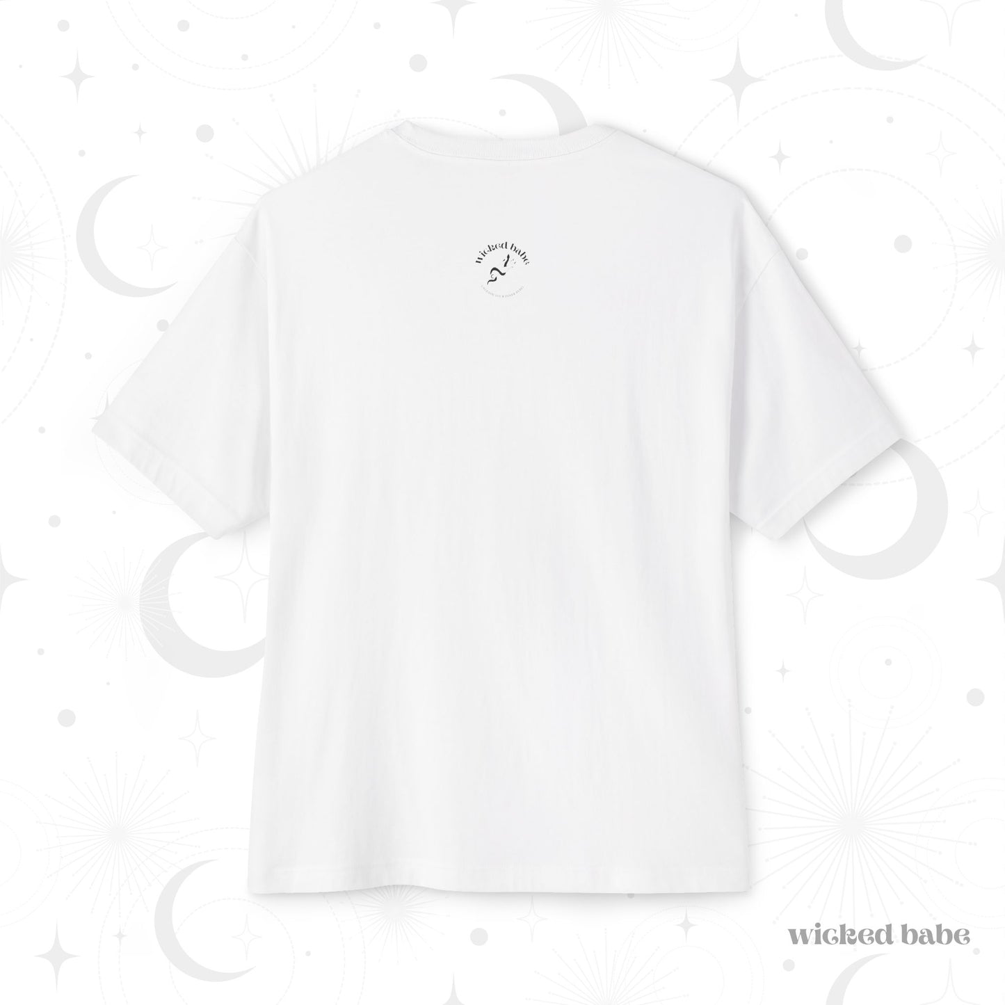 The back of an oversized short sleeve white t-shirt with small black wicked babe hand with serpent logo in the upper center
