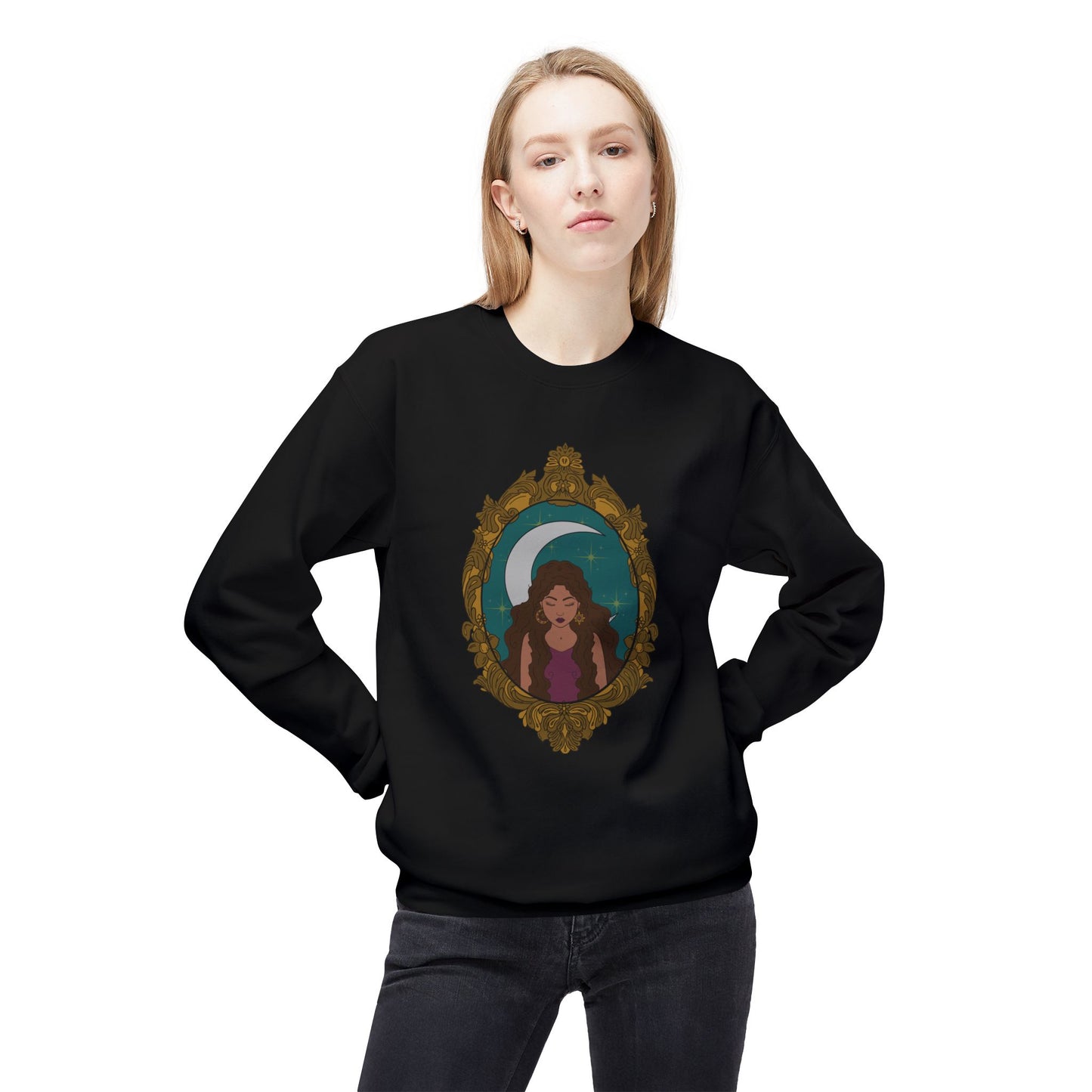 Woman wearing a black long sleeve crewneck sweatshirt with design of a tan skinned woman with brown wavy hair wearing purple in front of large crescent moon on a teal background surrounded by ornate gold frame