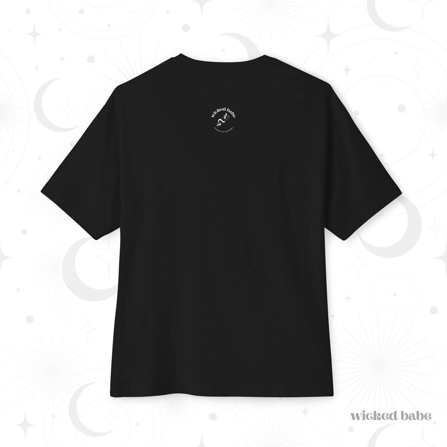 The back of an oversized short sleeve black t-shirt with small white wicked babe hand with serpent logo in the upper center