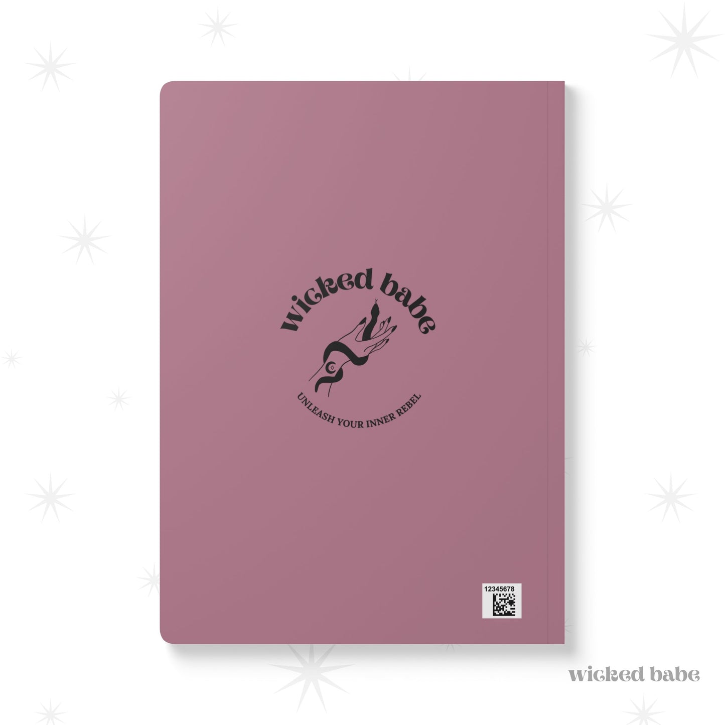 Back of pink softcover journal notebook with black wicked babe hand with serpent logo in the center
