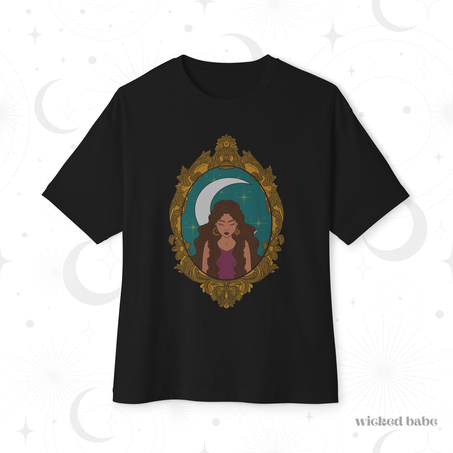 Oversized short sleeve black t-shirt with a design of a tan skinned woman with brown wavy hair wearing purple in front of large crescent moon on a teal background surrounded by ornate gold frame