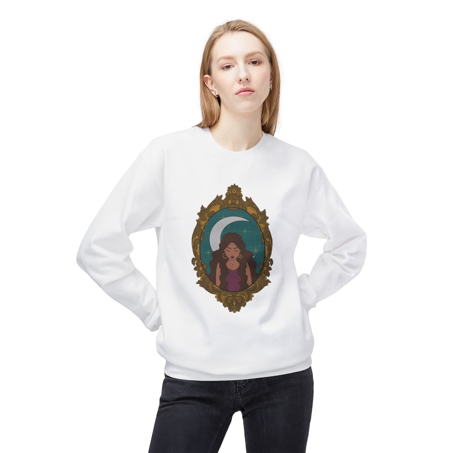 Woman wearing a white long sleeve crewneck sweatshirt with design of a tan skinned woman with brown wavy hair wearing purple in front of large crescent moon on a teal background surrounded by ornate gold frame
