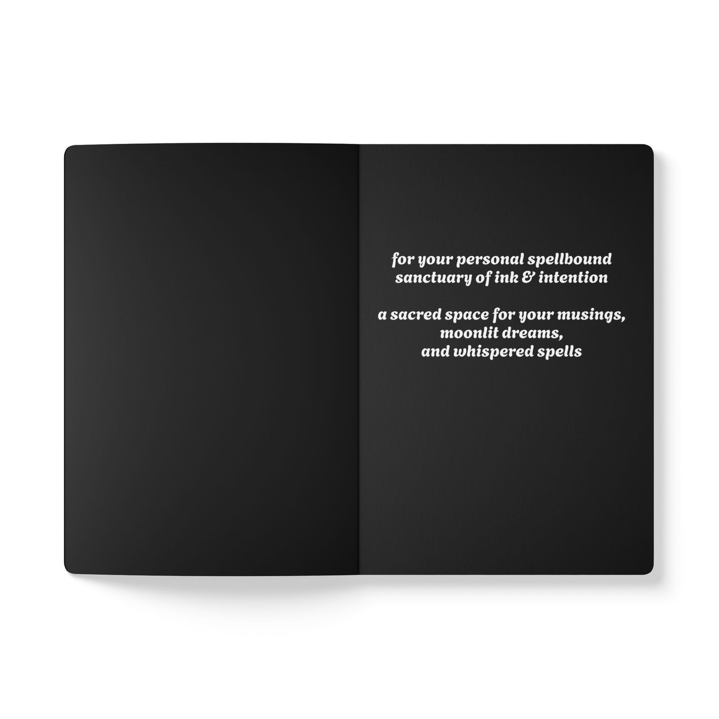Inside second page of black journal notebook with inspirational text in white