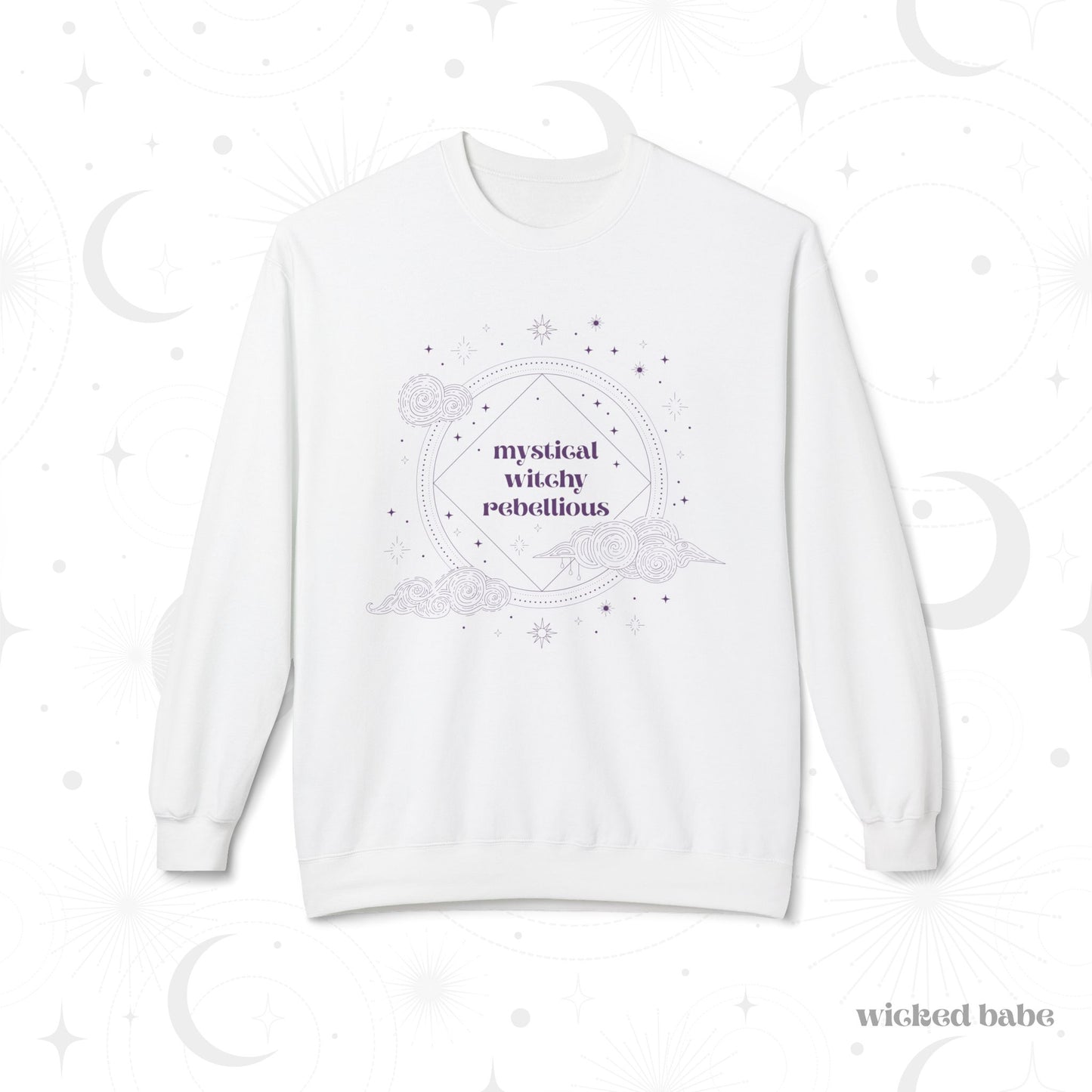 White long sleeve crewneck sweatshirt with mystical witchy rebellious text in purple surrounded by clouds and stars