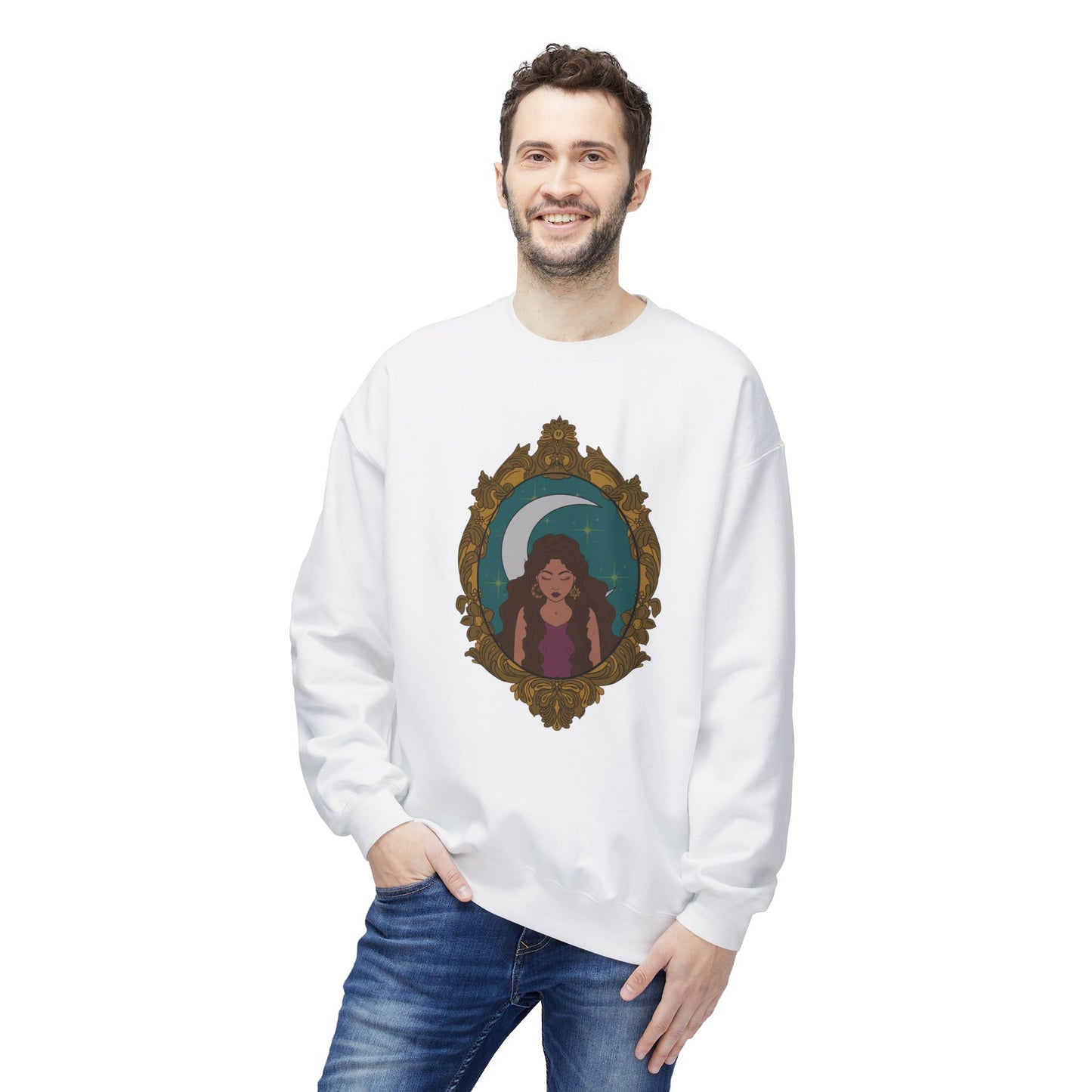 Man wearing a white long sleeve crewneck sweatshirt with design of a tan skinned woman with brown wavy hair wearing purple in front of large crescent moon on a teal background surrounded by ornate gold frame
