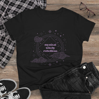 Black short sleeve crewneck t-shirt with mystical witchy rebellious text in purple surrounded by clouds and stars, on a wooden background with jeans and sneakers