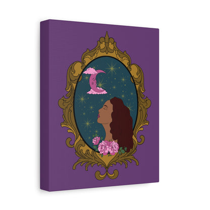 Side view of matte purple canvas wall art with design of a tan skinned woman with red brown wavy hair with pink flowers and a pink crescent moon above on a teal background surrounded by an ornate gold frame