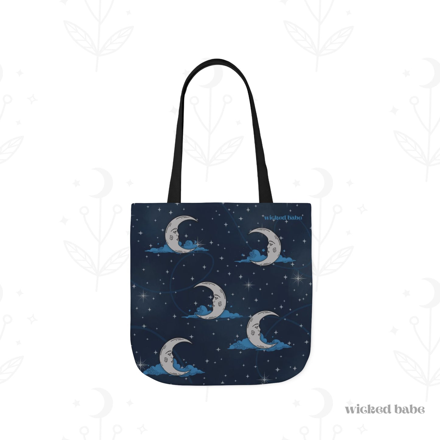 The front of a 16x16 inch tote bag with blue celestial sky background with silver crescent moon and stars