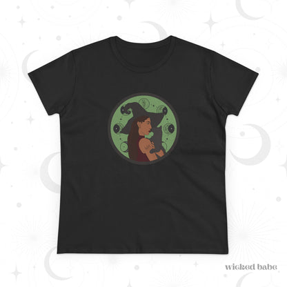 Black short sleeve crew neck t-shirt featuring a design of a woman wearing a witch's hat holding a gray cat with moon phases on a green background