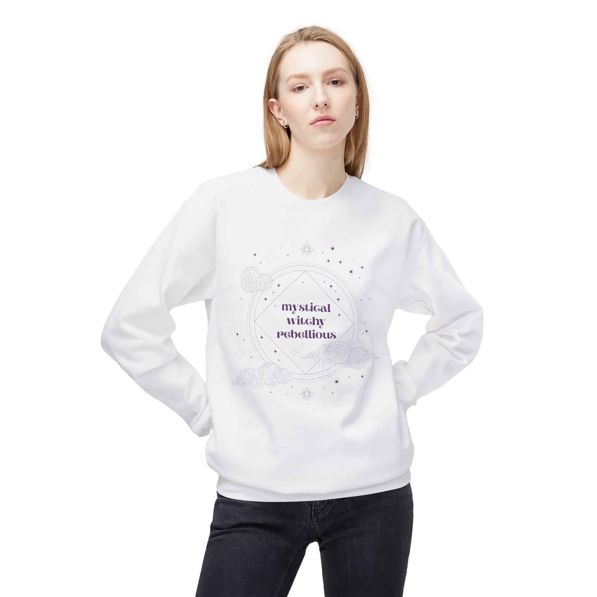 Woman wearing a white long sleeve crewneck sweatshirt with mystical witchy rebellious text in purple surrounded by clouds and stars