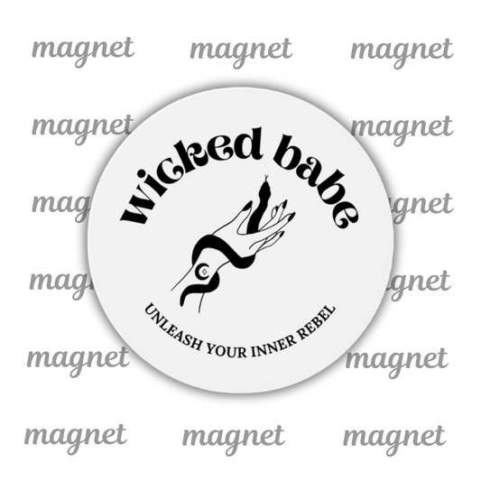 White circular refrigerator magnet with 'wicked babe' hand with serpent logo in black
