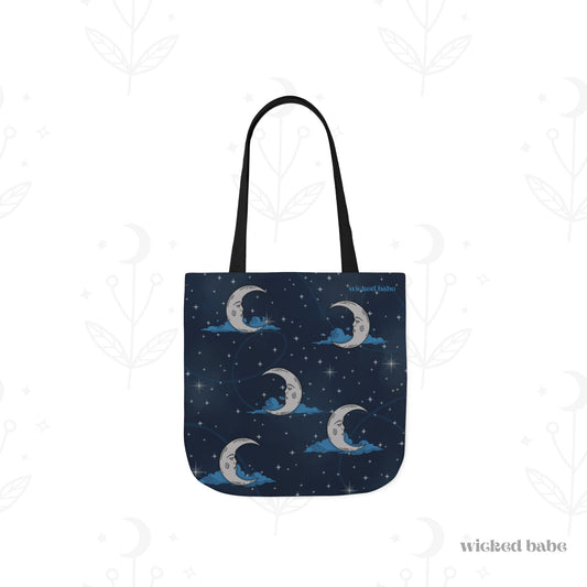 The back of a 13x13 inch tote bag with blue celestial sky background with silver crescent moon and stars