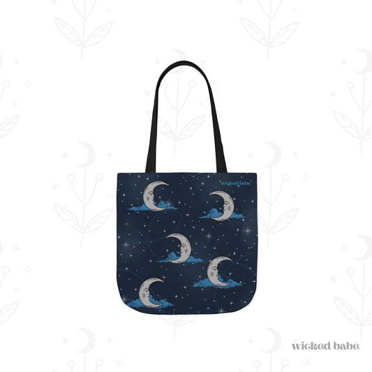 Front of a 13x13 inch tote bag with blue celestial sky background with silver crescent moon and stars