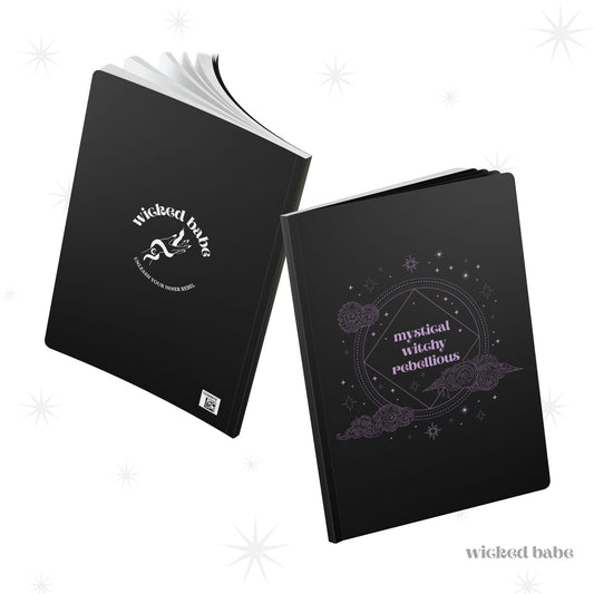 Front and back of black journal with mystical witchy rebellious text in purple on front cover, white wicked babe hand with serpent logo in the center on the back